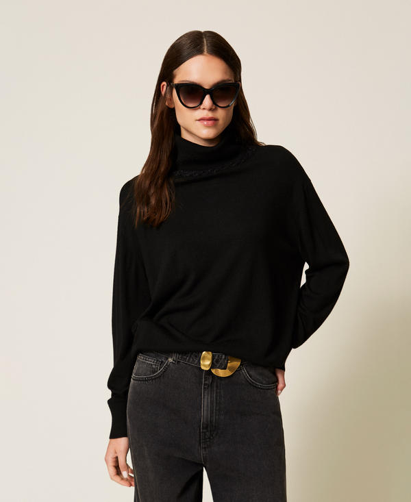 Maglia dolcevita lurex con treccia