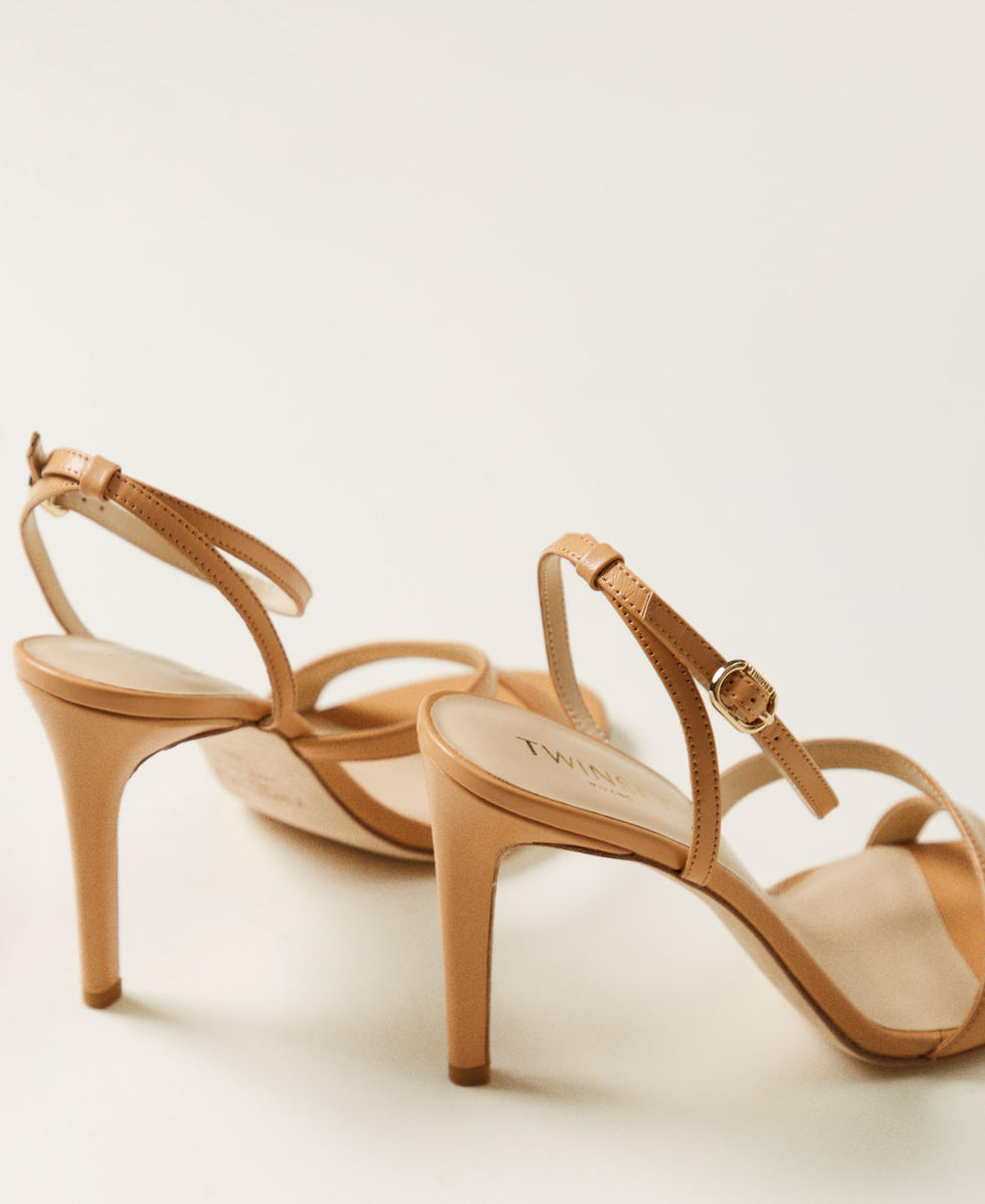 High-heeled leather sandals