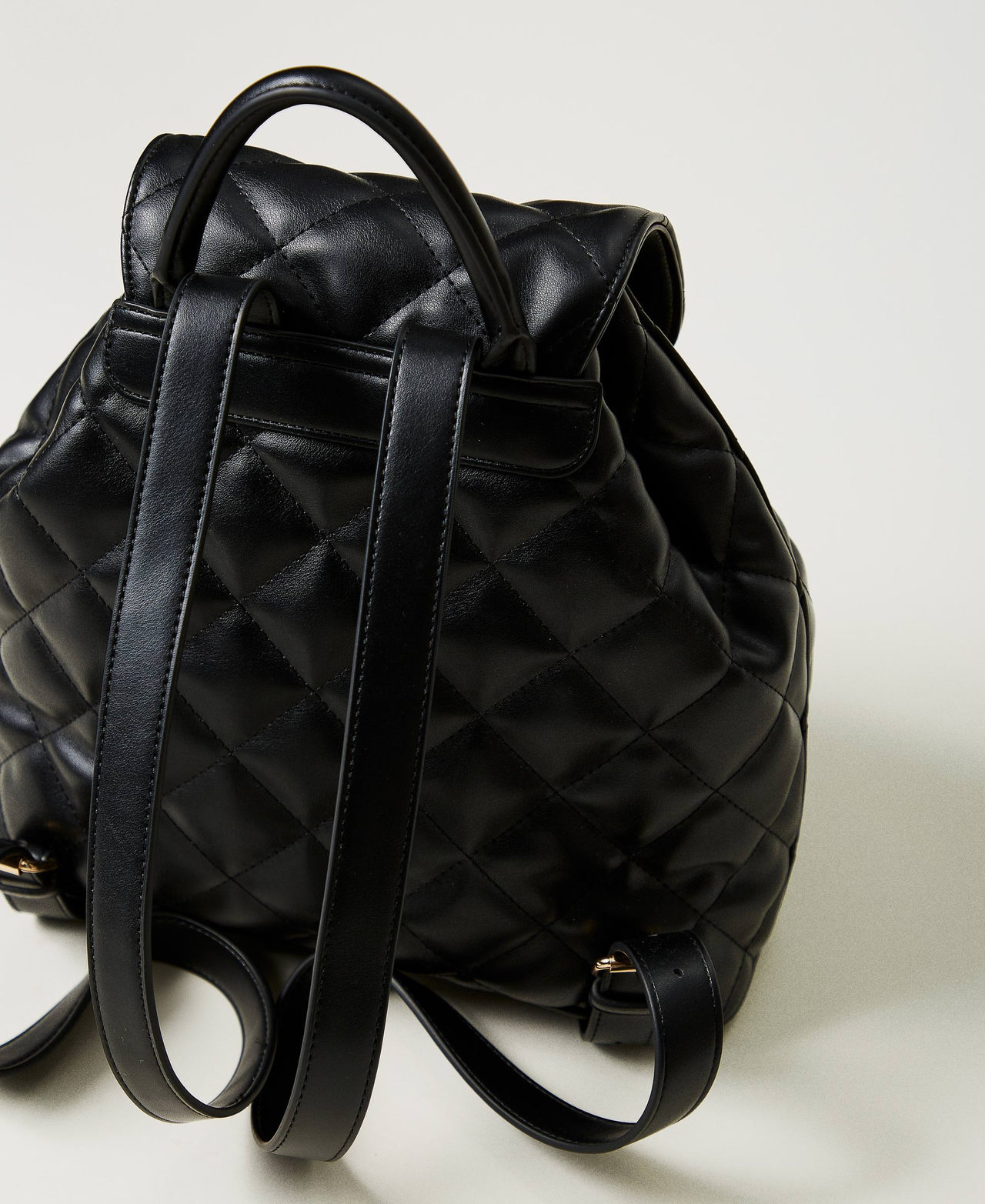 ‘Audrey’ quilted backpack with Oval T