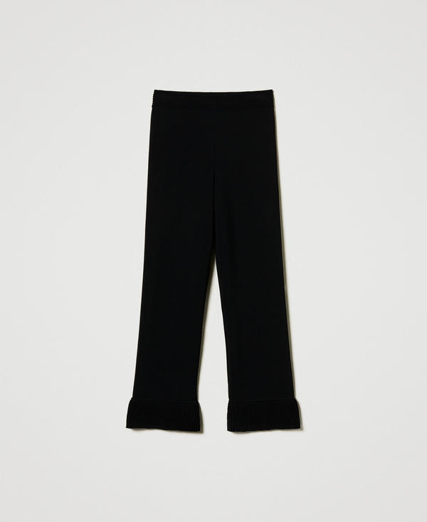 Pantaloni flare in maglia