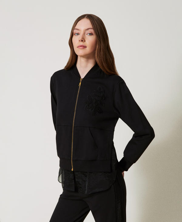 Sweatshirt with embroidery and organza insert