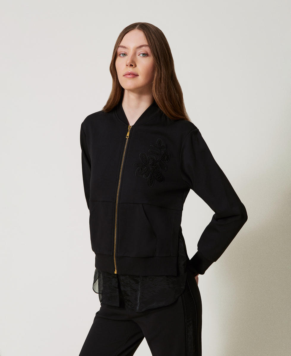 Sweatjacke mit Stickerei und Organza-Einsatz Schwarz Frau 251LL2HAA_00006_01