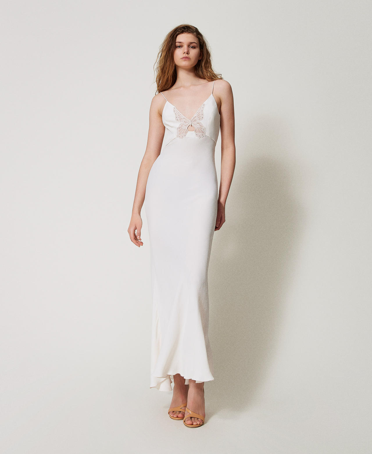 Long slip dress with an embroidered butterfly