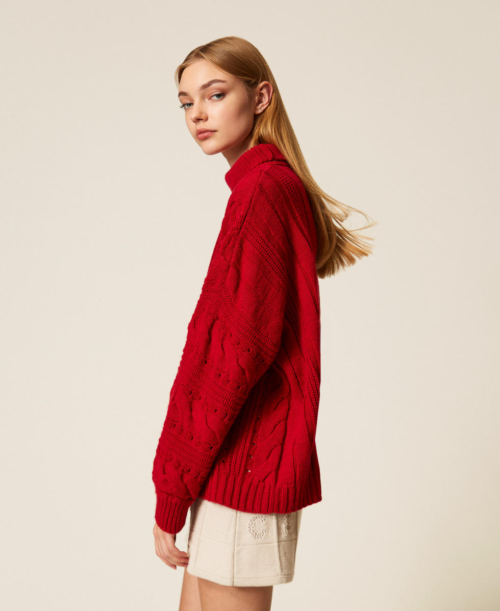 Maxi pull en laine m&eacute;lang&eacute;e avec torsades