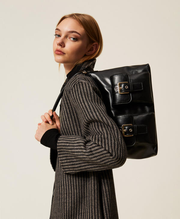 Shoulder bag with pockets and buckles