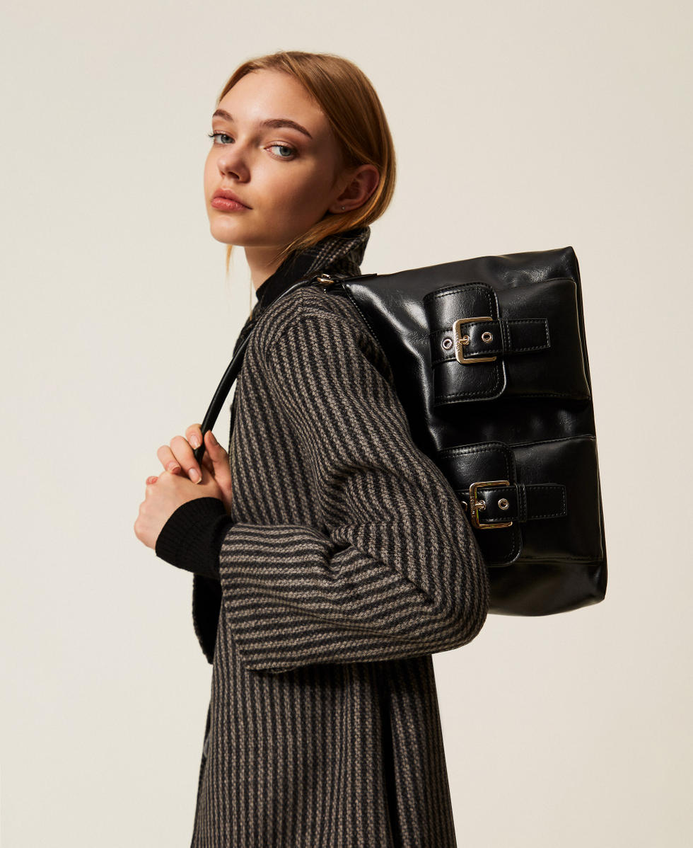 Shoulder bag with pockets and buckles