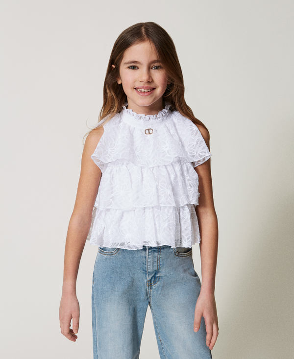 Embroidered tulle top with flounces