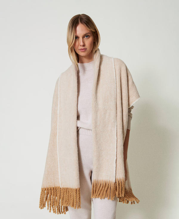 Mottled poncho with fringes