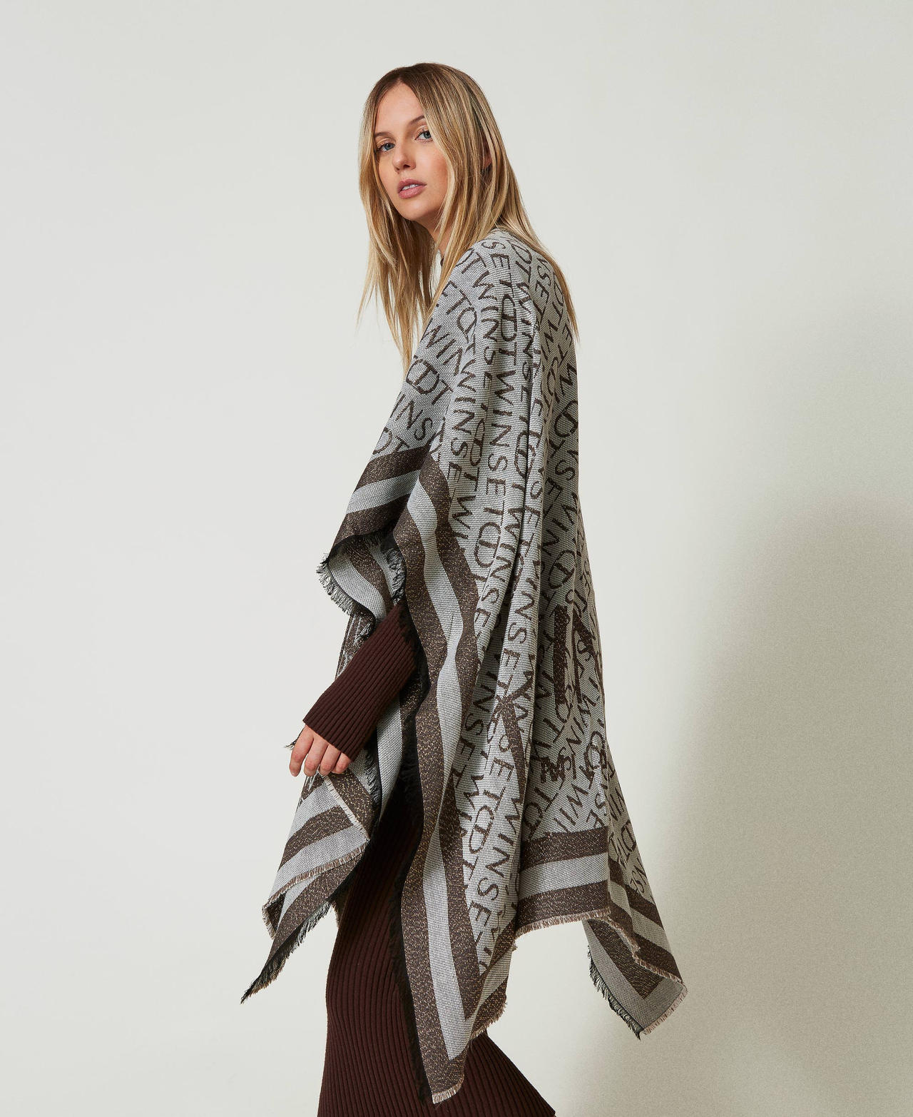 Jacquard poncho with logo