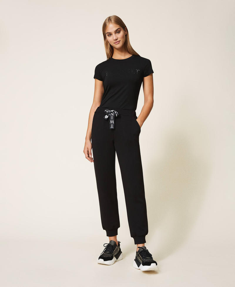 Pantal&oacute;n jogger de tela scuba Negro Mujer 202LI2JNN-01
