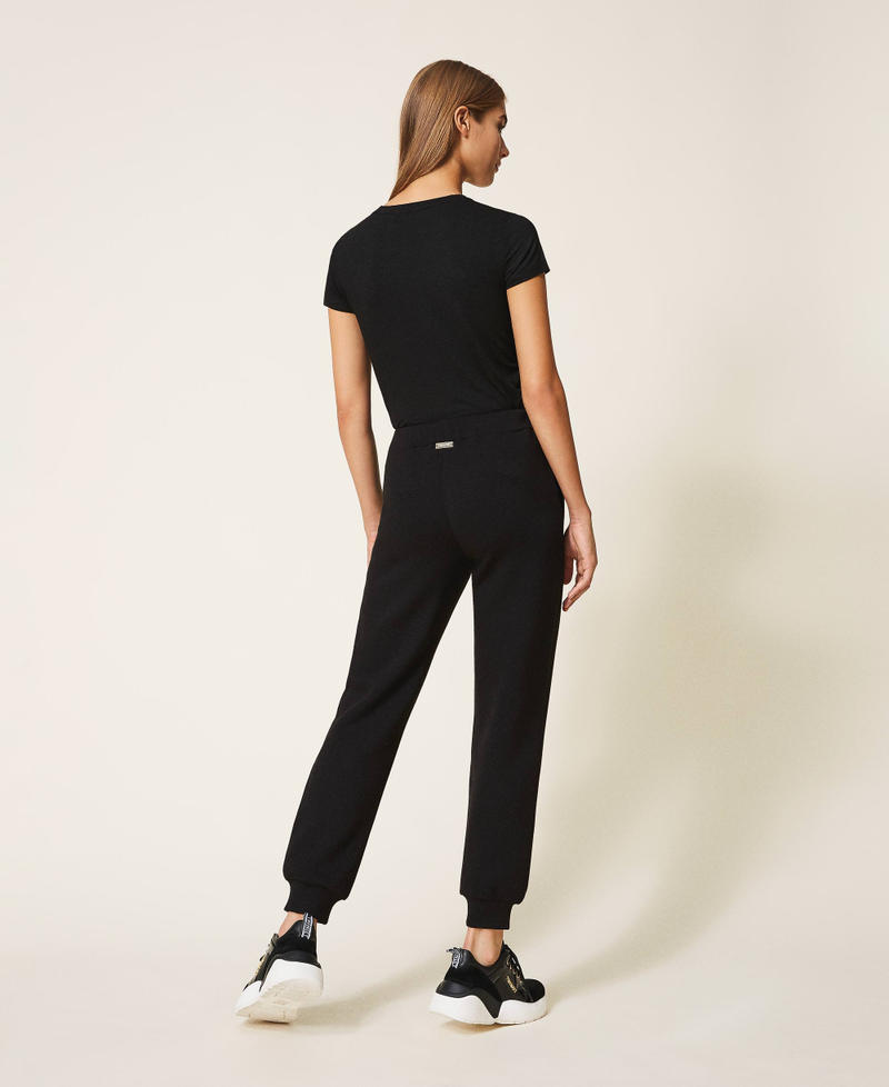 Pantal&oacute;n jogger de tela scuba Negro Mujer 202LI2JNN-03