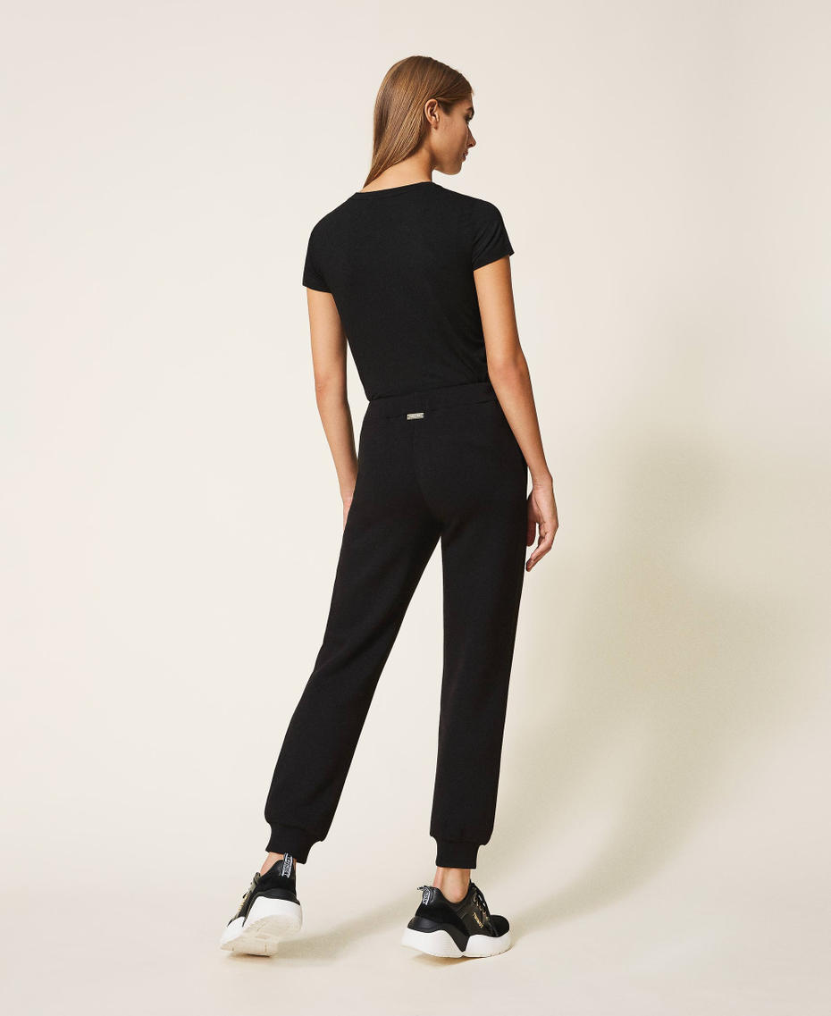Pantal&oacute;n jogger de tela scuba Negro Mujer 202LI2JNN-03
