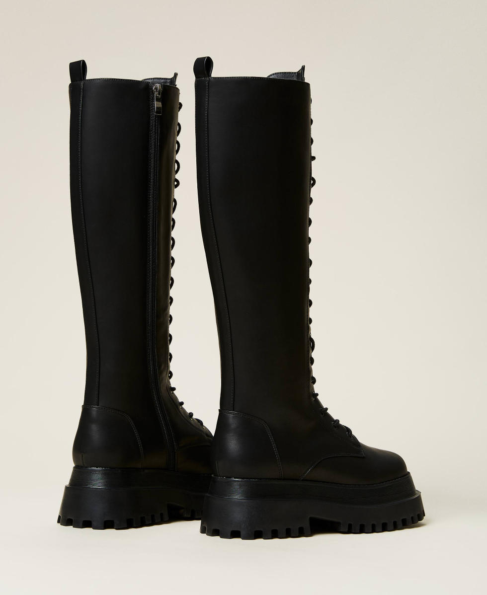 Tall black lace up combat boots top