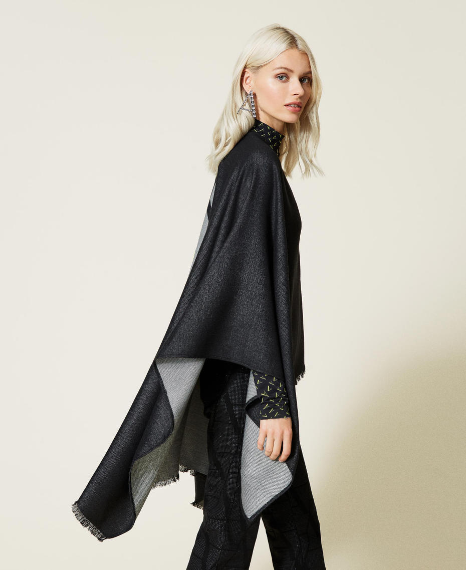 Wool poncho with logo and fringes. Black Woman 212AO5345-03