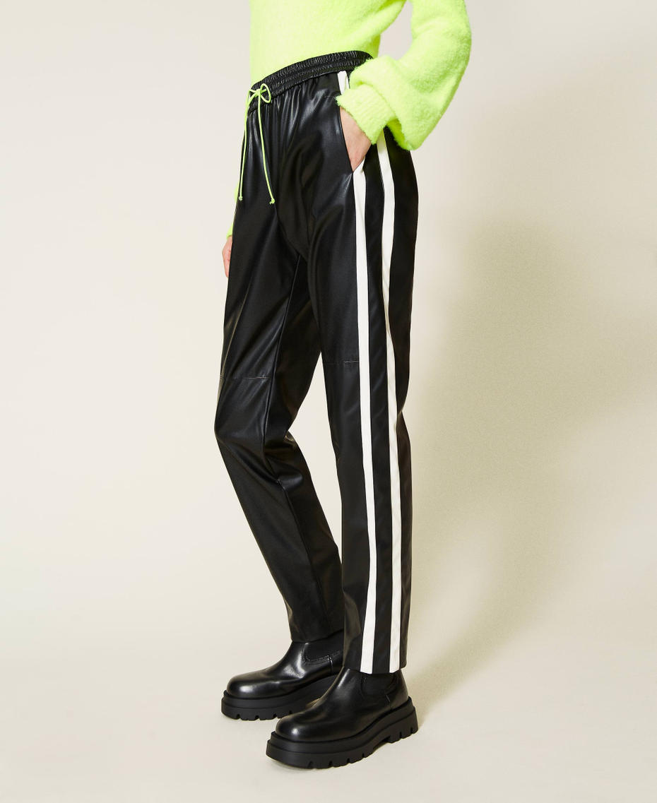 Joggers with contrasting bands Bicolour Black / Mother-of-pearl White Woman 212AT2401-04