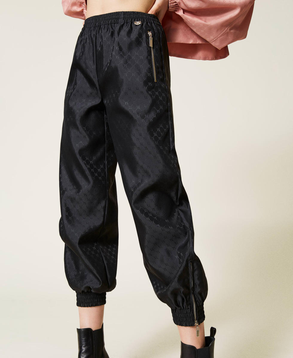 Joggers with logo all over Black Woman 212LI2LAA-04