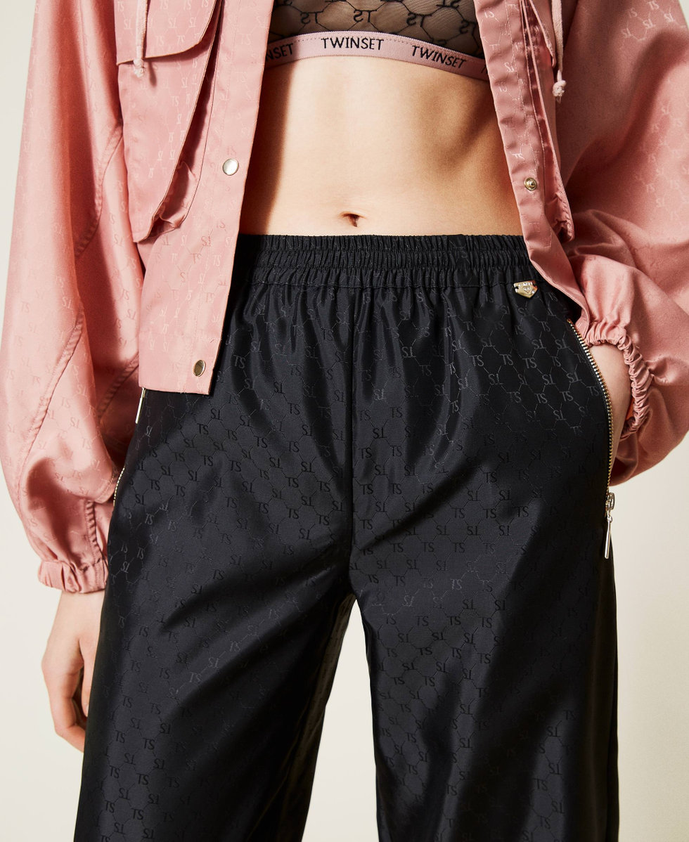 Joggers with logo all over Black Woman 212LI2LAA-05