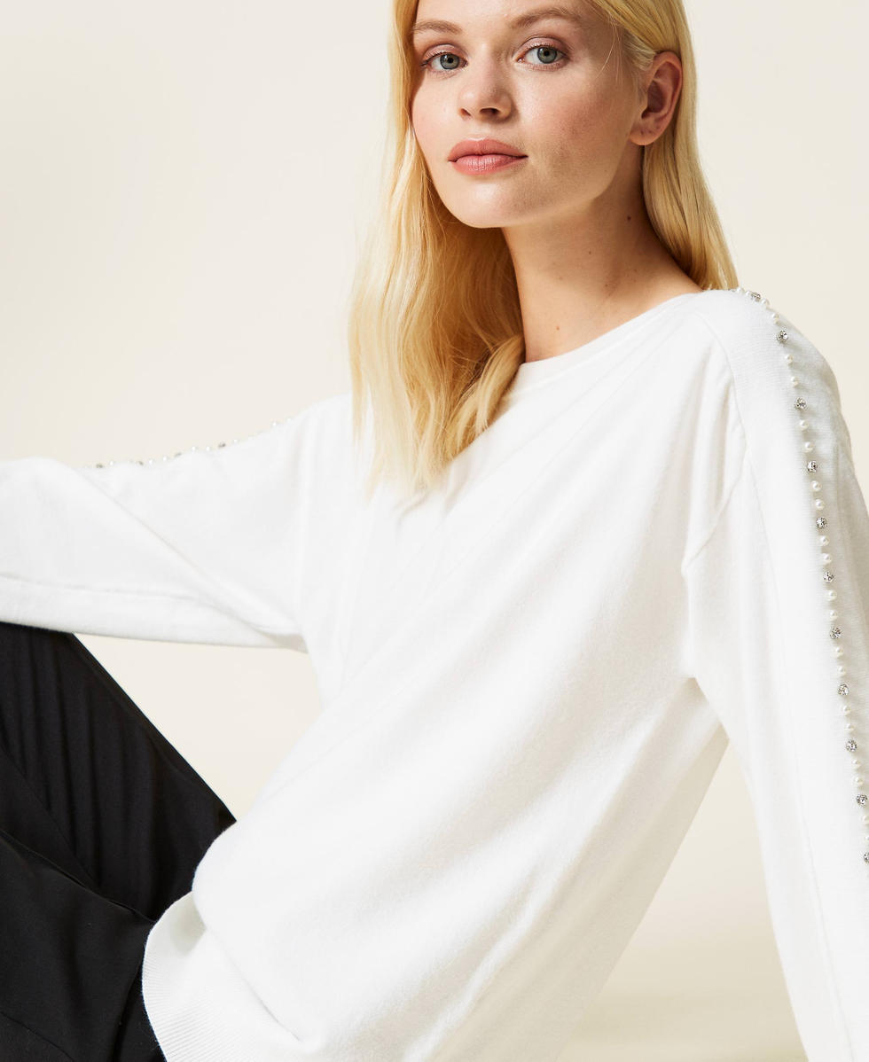 Jumpers with store pearls on
