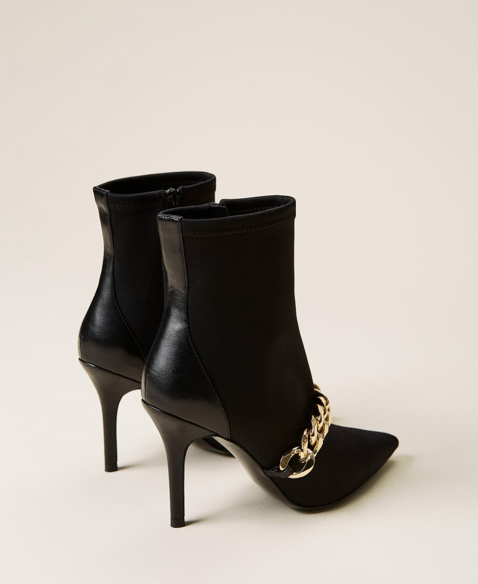 Black ankle boots with cheap chains
