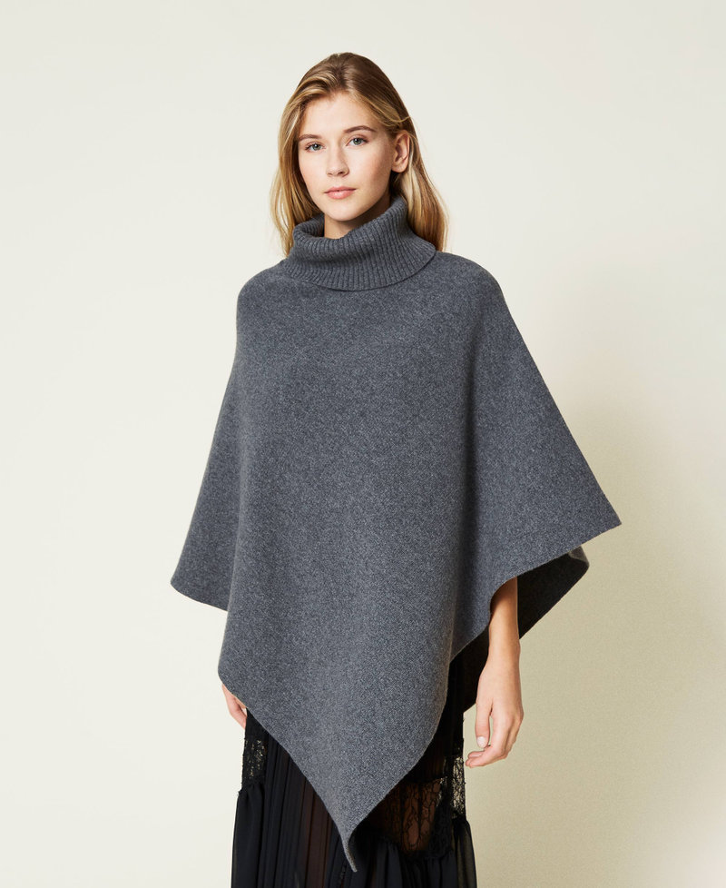 Poncho with merino wool and recycled yarn