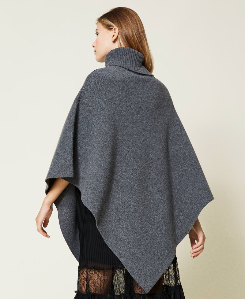 Poncho with merino wool and recycled yarn