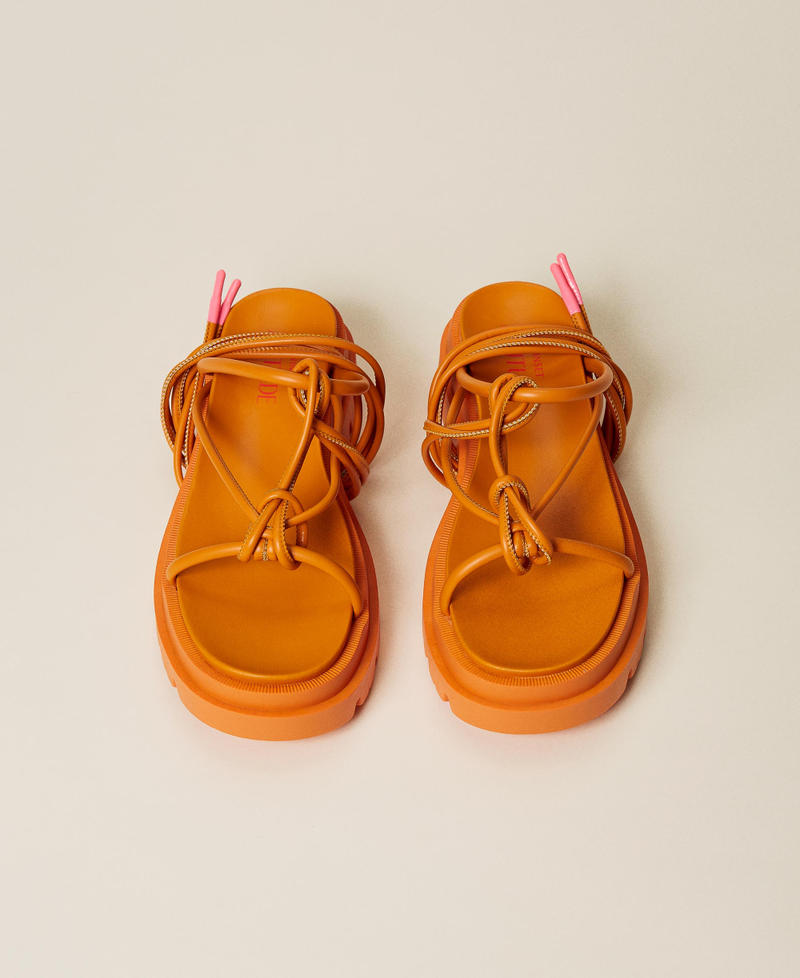 Thong sandals with laces