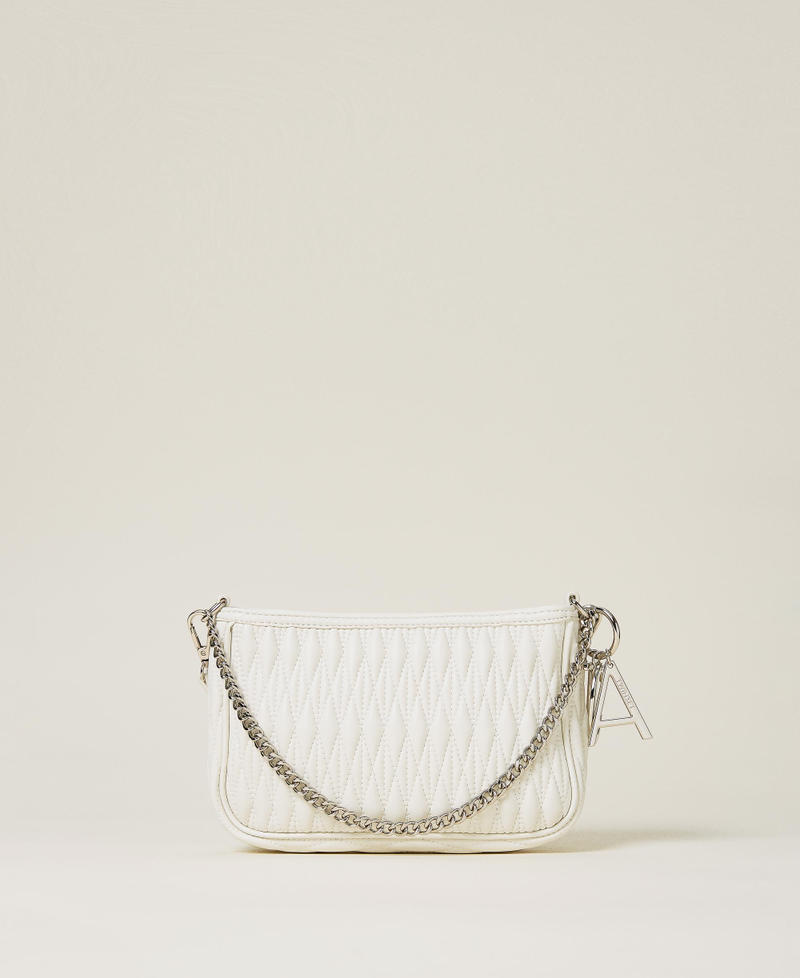 Quilted bag with chain and charms