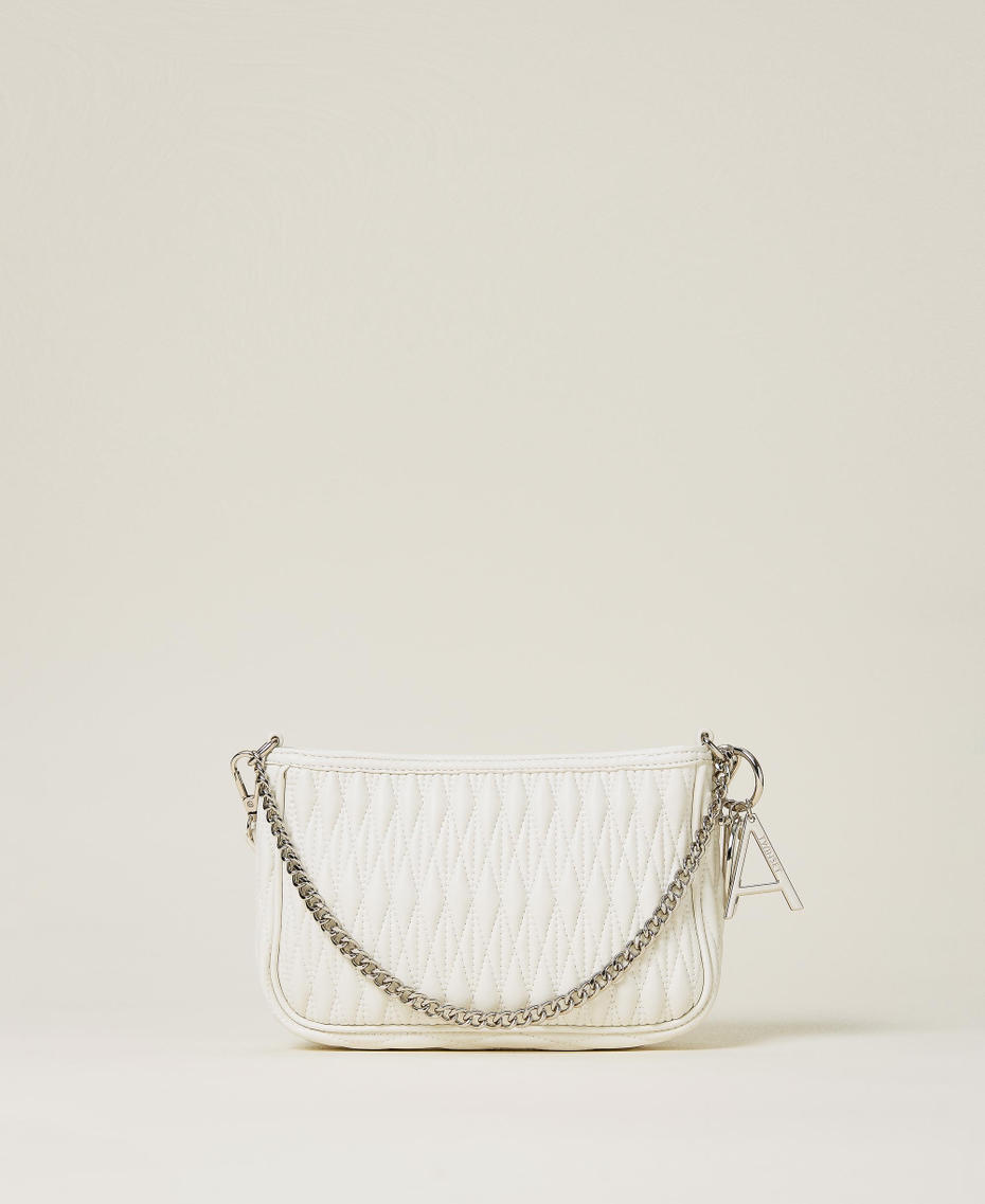 Quilted bag with chain and charms