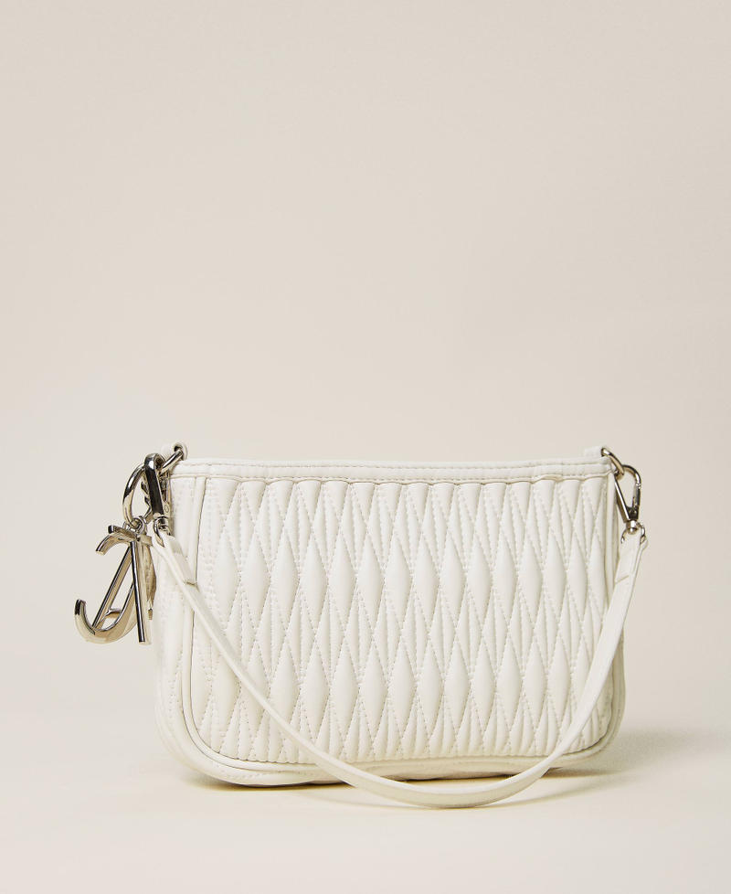 Quilted bag with chain and charms