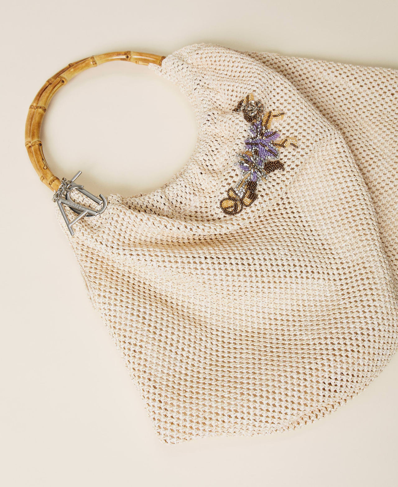 Shopper with embroidery and charms