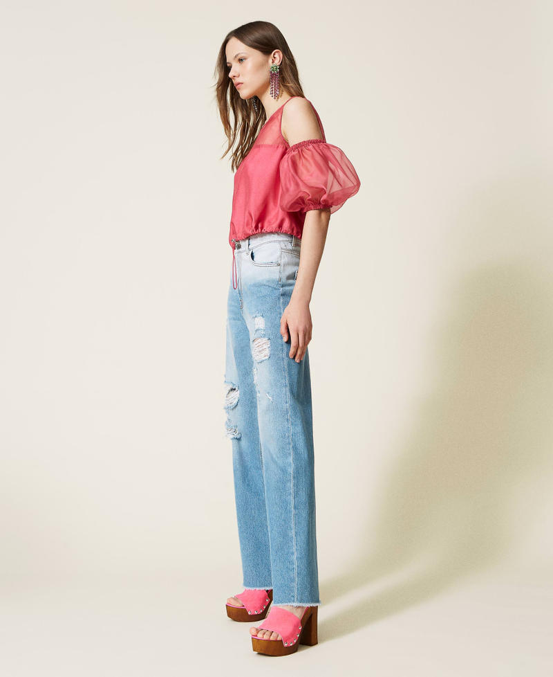 Organza top with removable sleeves.