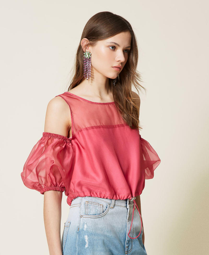Organza top with removable sleeves.