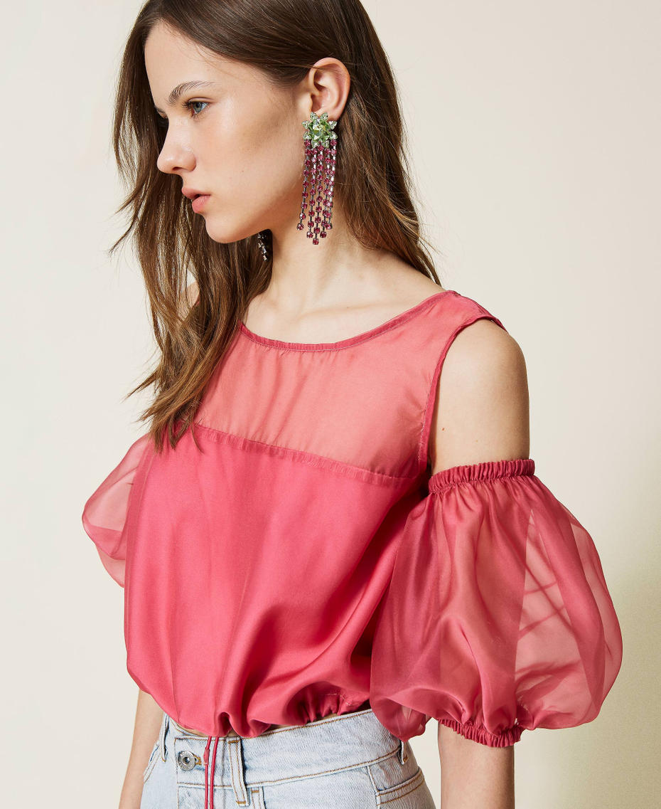 Organza top with removable sleeves.