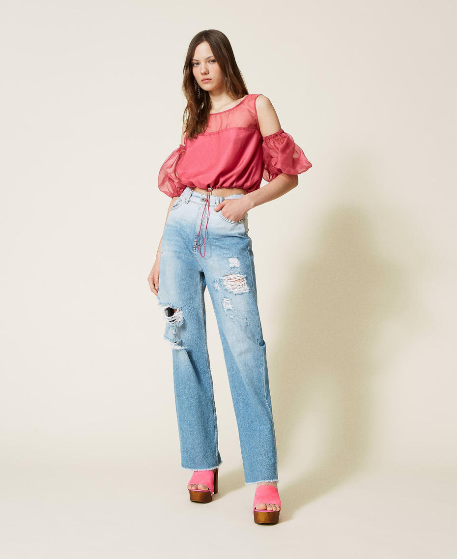 Organza top with removable sleeves.