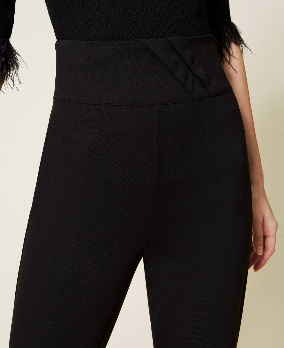 Zigarettenhose mit Falten