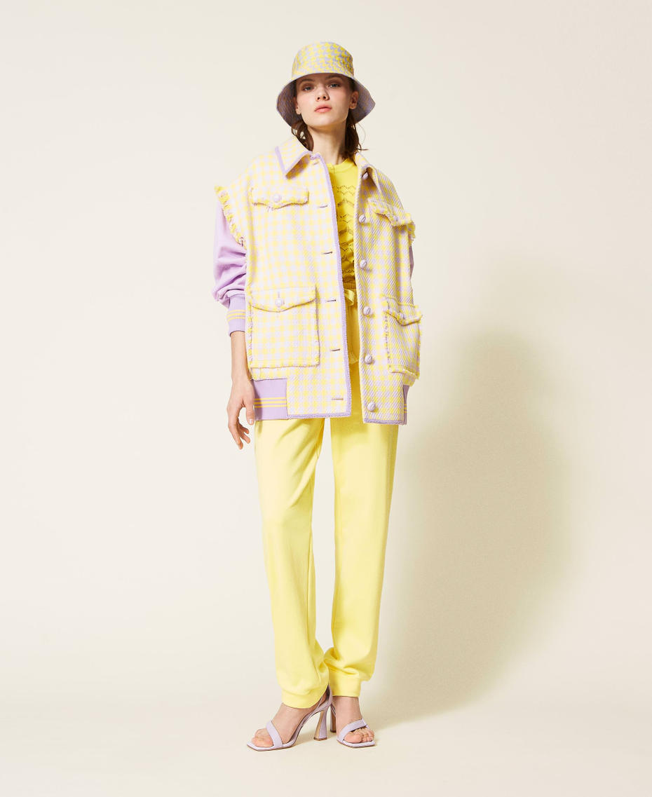 Houndstooth jacket with removable sleeves