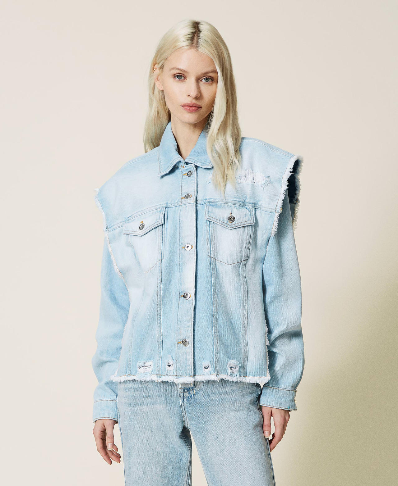 Denim jacket with removable sleeves