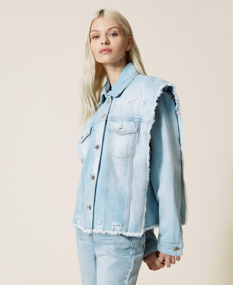 Denim jacket with removable sleeves