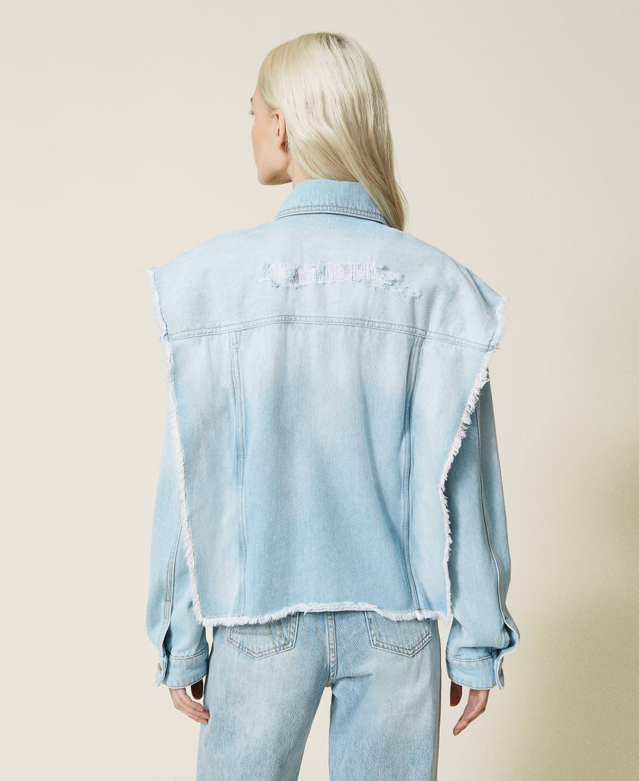 Denim jacket with removable sleeves