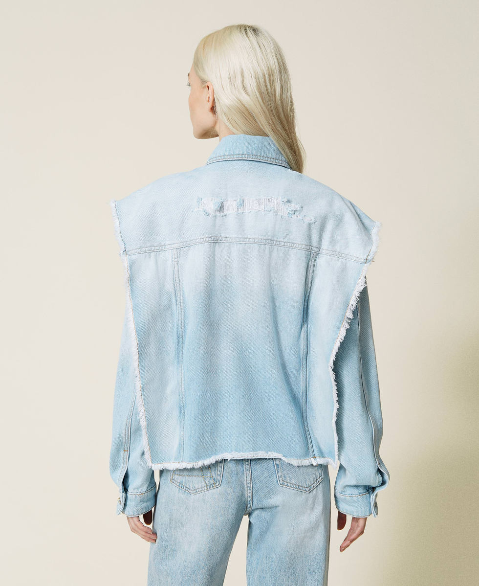 Denim jacket with removable sleeves