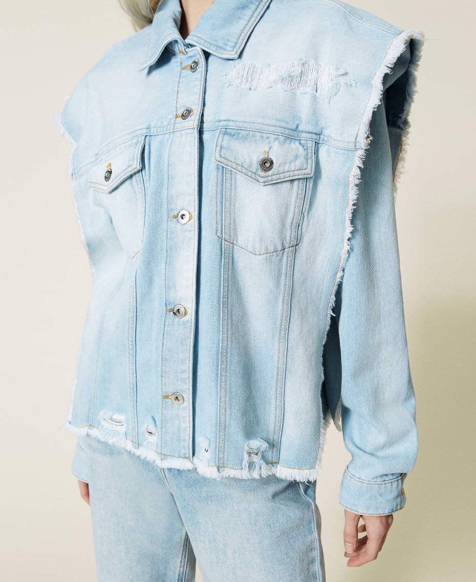 Denim jacket with removable sleeves
