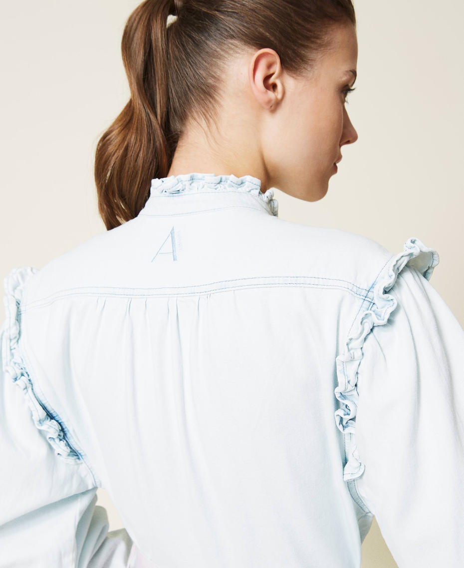 Asymmetric denim shirt with ruffles