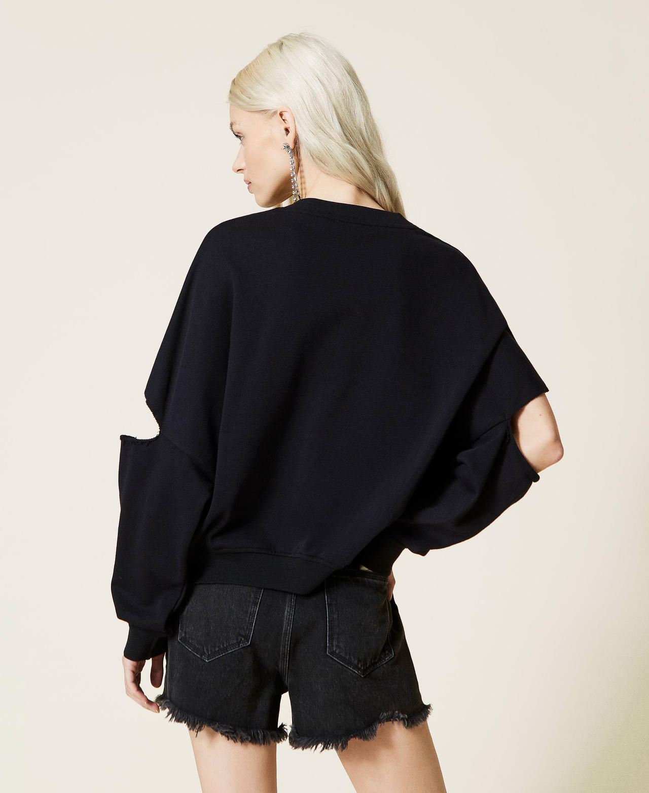 Sweatshirt mit Cut-outs, Logo und Spitze