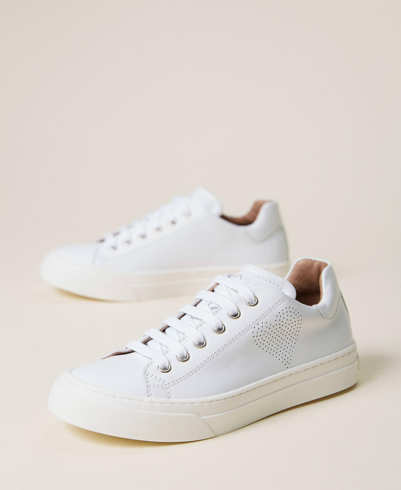 Leather trainers with openwork heart White Girl 221GCJ020-02