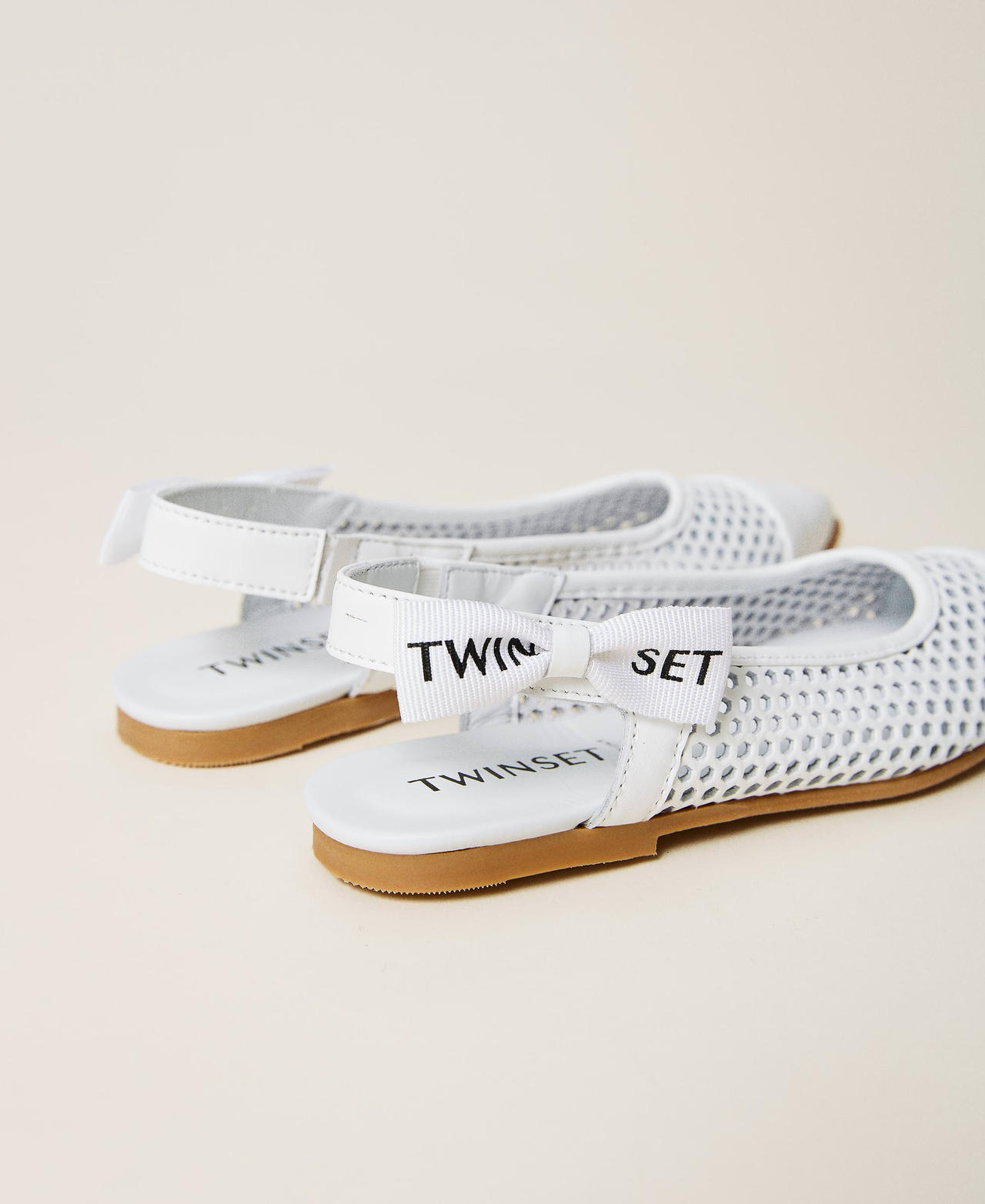 Lasered leather sling back ballerina flats