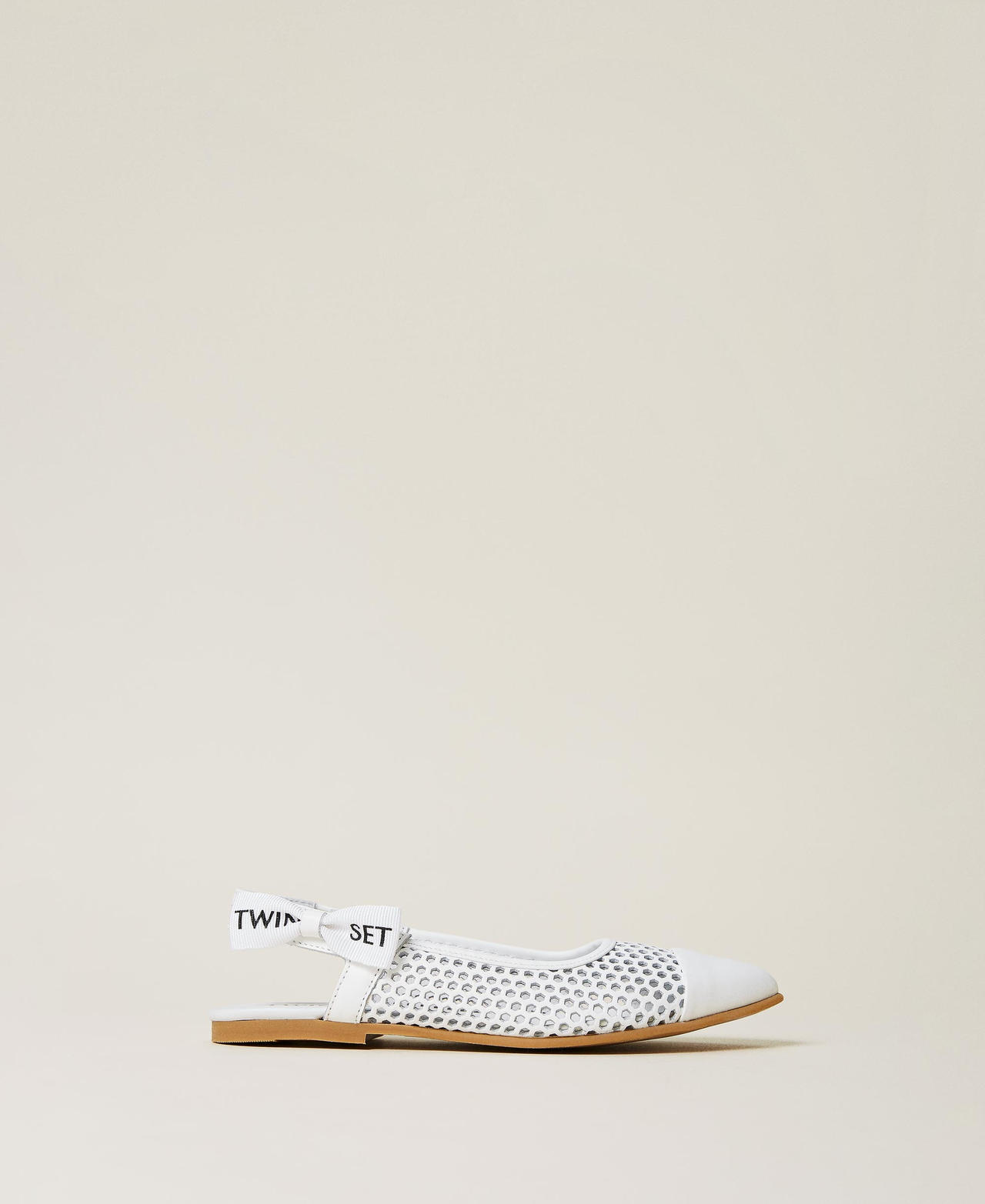 Lasered leather sling back ballerina flats