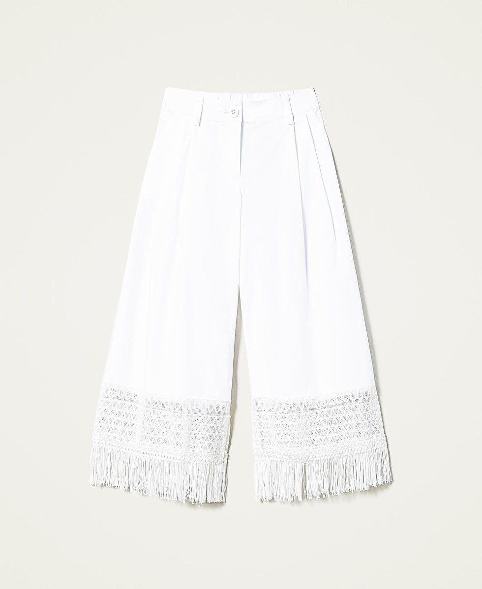 Pantaloni con pizzo e frange