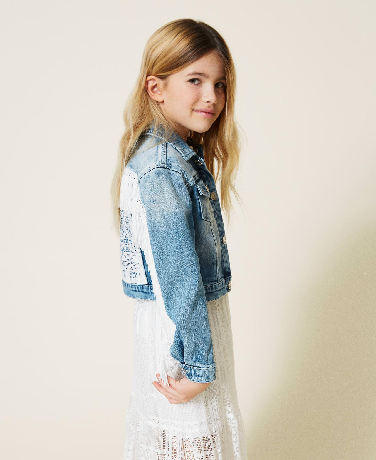 Denim jacket with lace and fringes