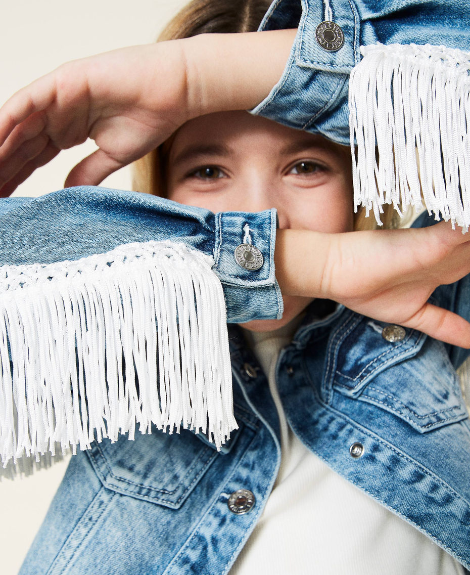 Denim jacket with lace and fringes