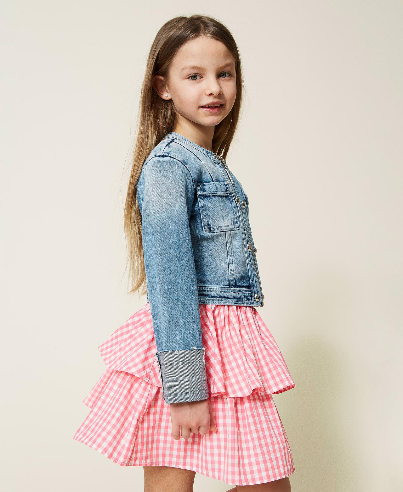 Denim jacket with riveted studs